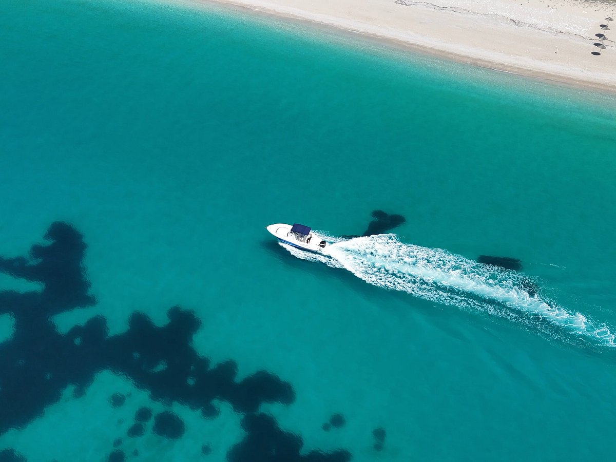 Easy Go speedboat on the turquoise waters of Krorëz, Albanian Riviera
